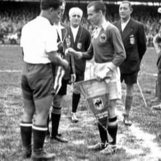 Cuba exchanges pennants with their Romanian counterpart.