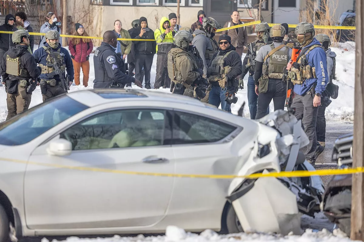 	Homeland Security says Minneapolis woman shot by ICE officer dies	